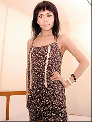 Sizzling ladyboy strips out of black lingerie